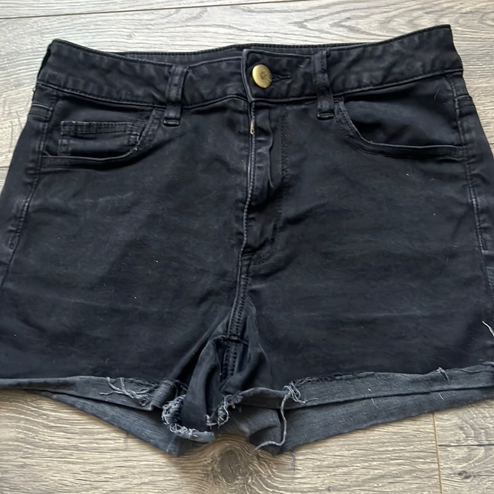 American Eagle black soft denim Hi-Rose Shortie shorts.